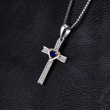 Angelic 925 Sterling Silver Cross Heart Blue Sapphire Pendant- Factory Direct Prices - The Jewellery Supermarket